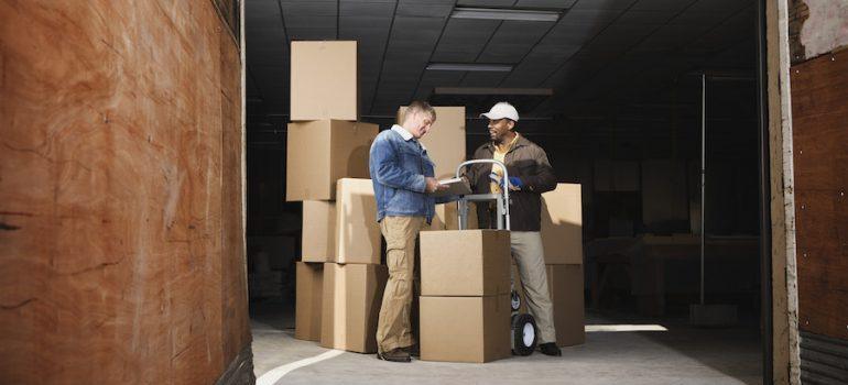 Man signing for delivery