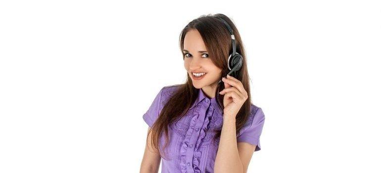 A girl wearing a headset, representing household movers